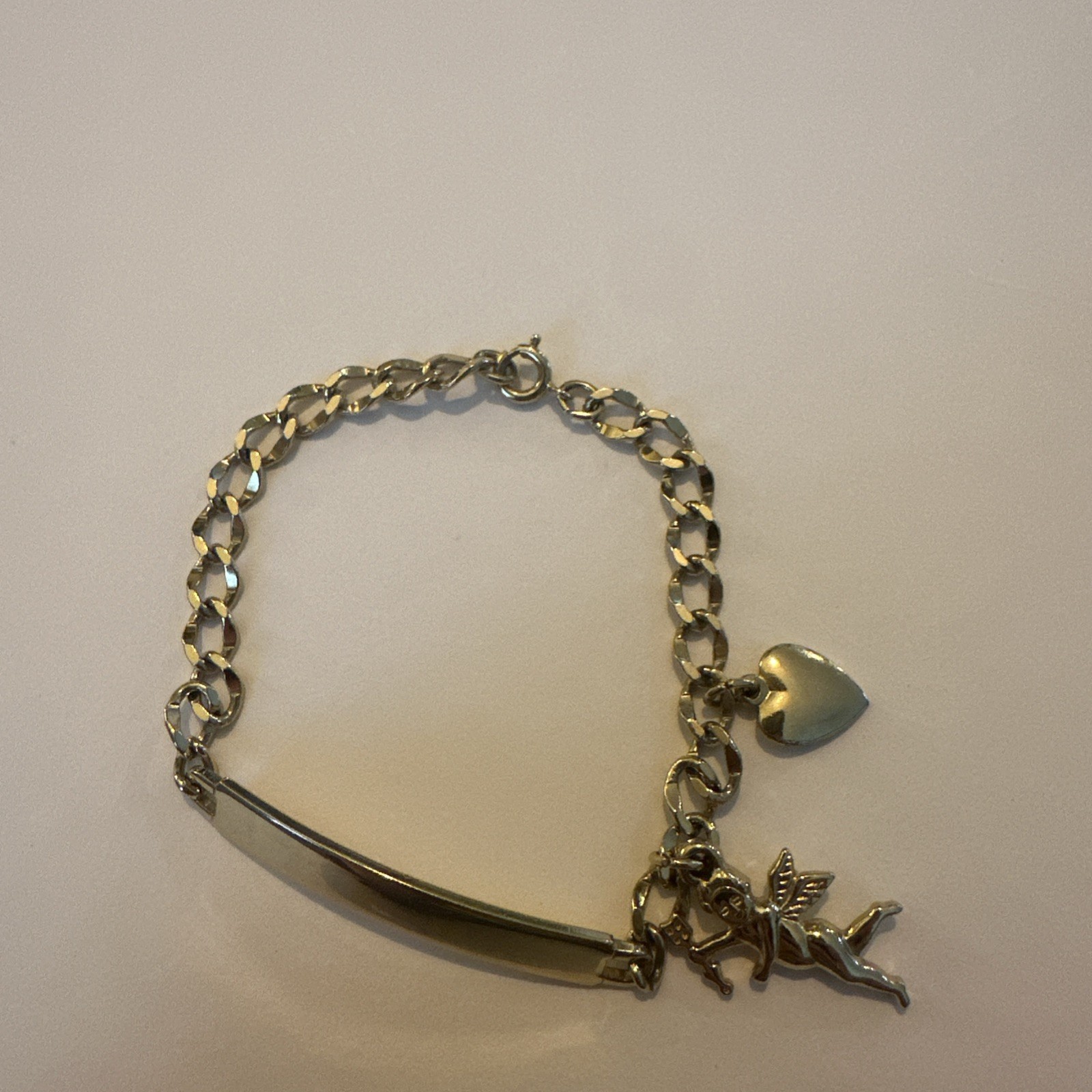 Vintage Speidel female yellow tone ID Bracelet W/ Angle And Heart Charms 7 Inche