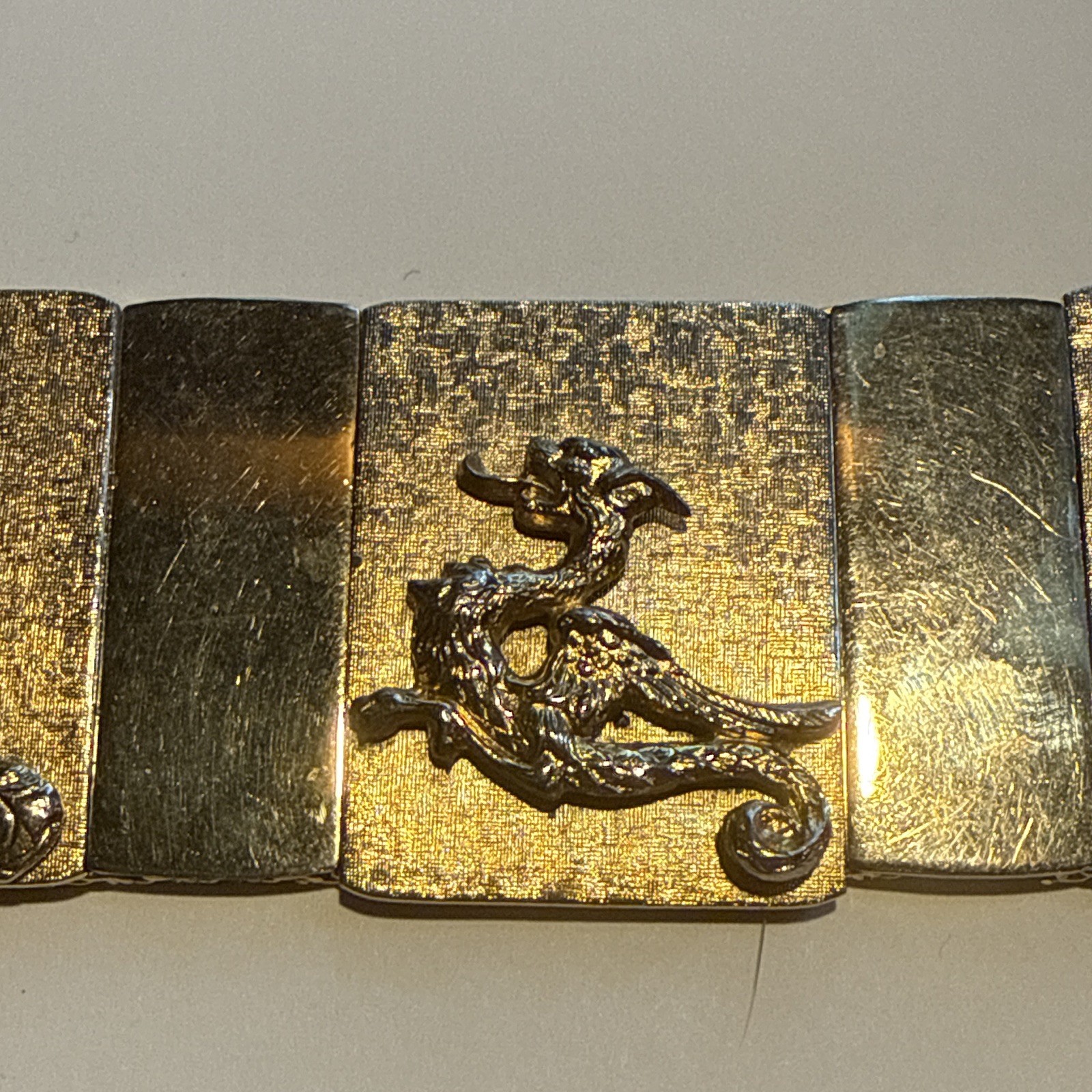 VINTAGE GOLD TONE BUDDHA DRAGON PANEL LINK BRACELET WITH SAFETY CHAIN