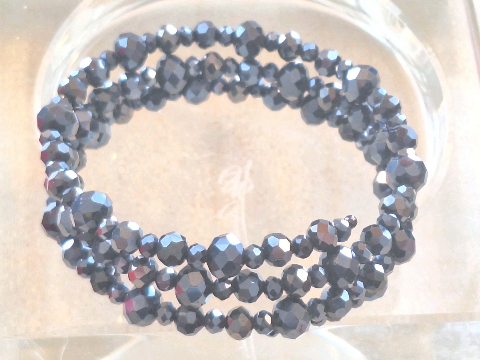 Avon MIDNIGHT SHIMMER COIL BRACELET OF CRYSTAL BEADS NEW 2 3/4 × 3/4 In