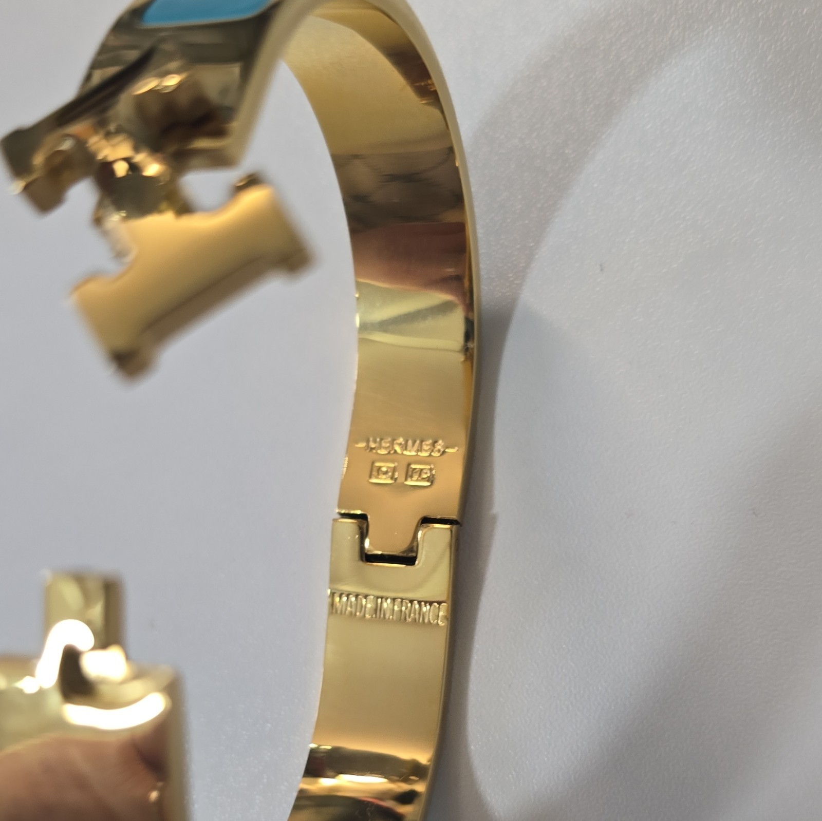 HERMÈS Signed Gold Tone Blue Enamel Hinged Bangle Cuff Bracelet France