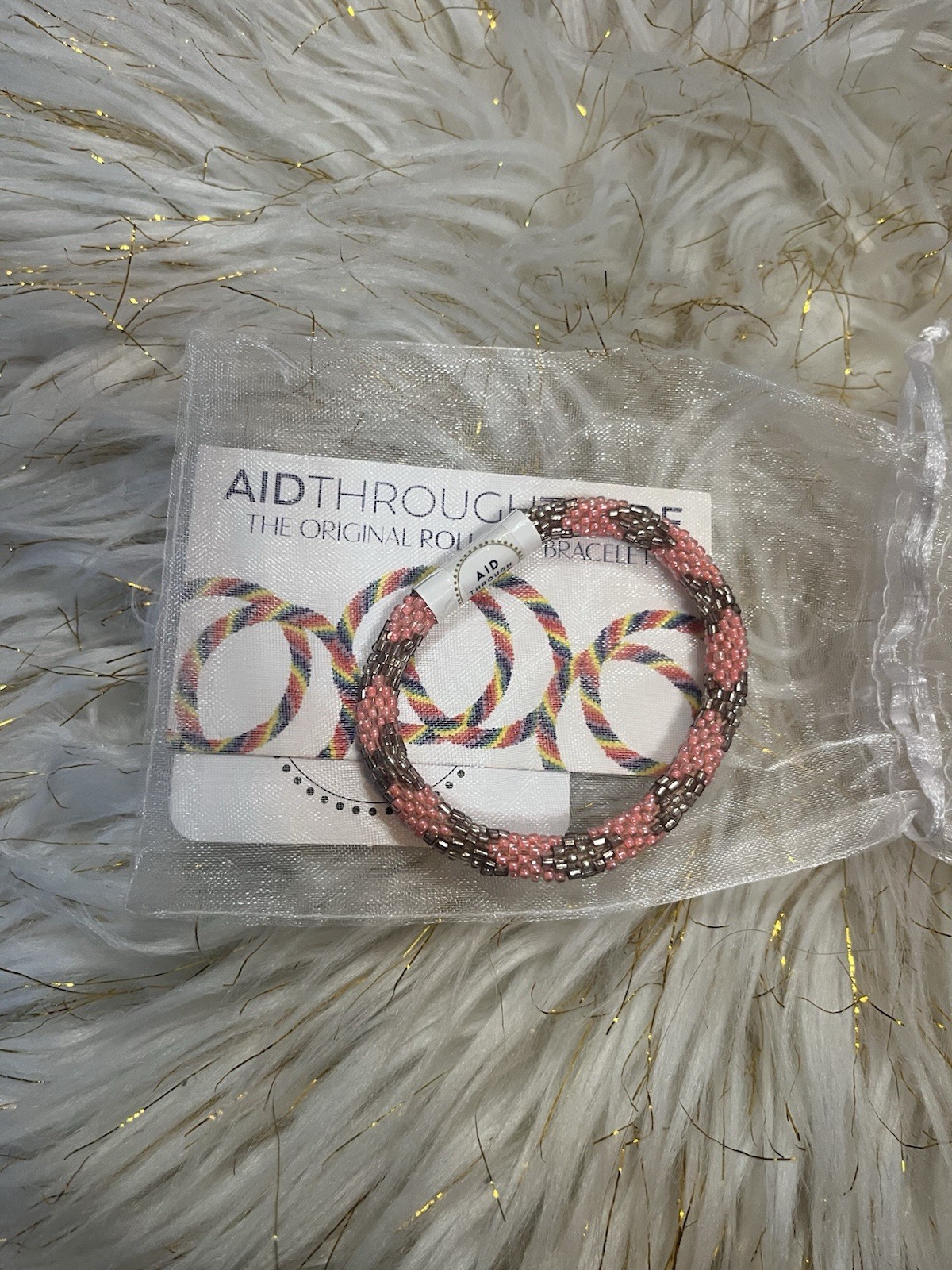 Aid Through Trade Roll-On Bracelet Seed Glass Bead Pink Gold Snake Diamond Nepal