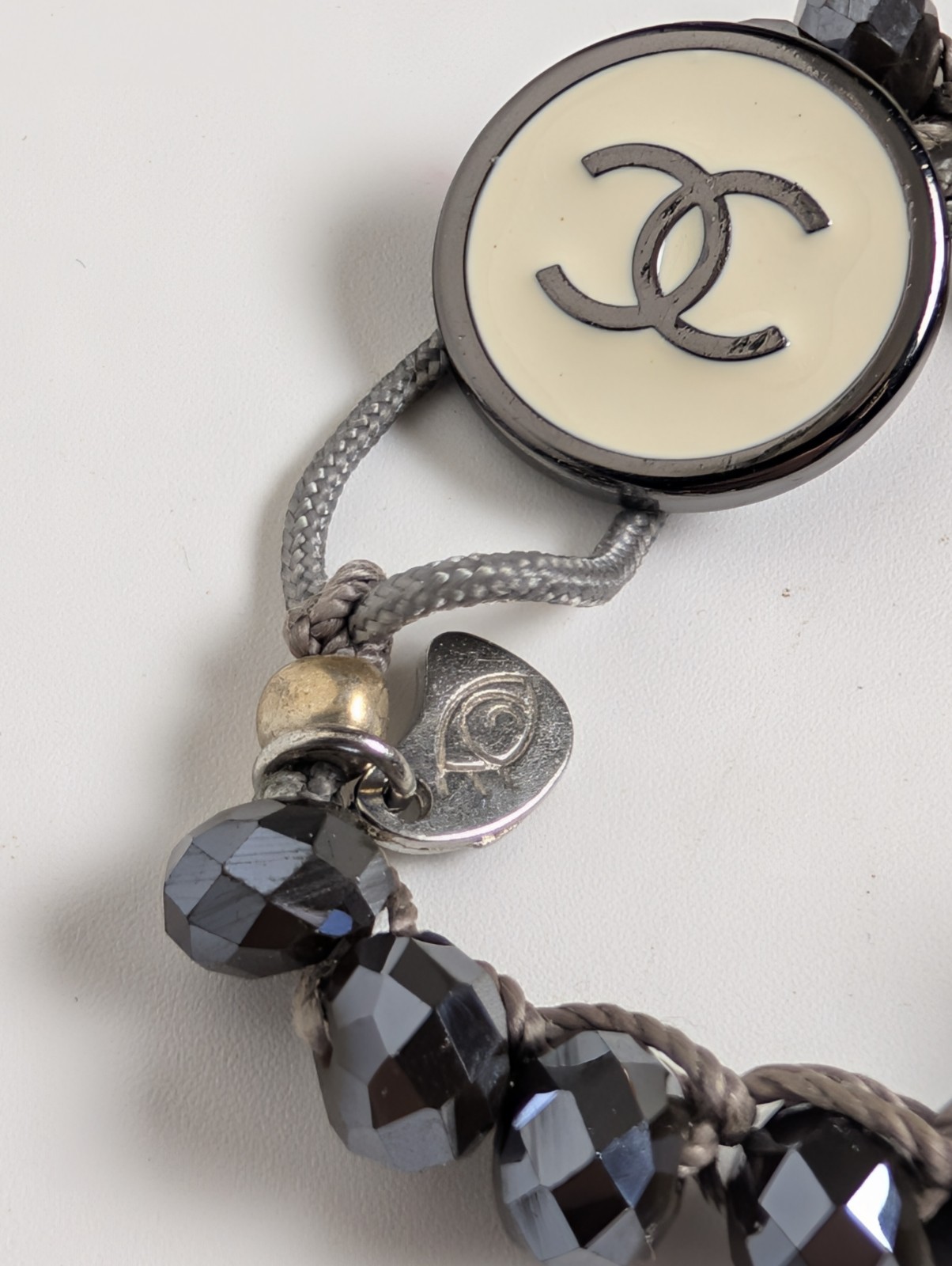 Chanel Button Logo Beaded Cord Bracelet Hematite Tone Gray IJewels Charm