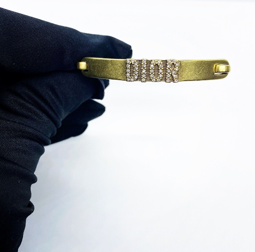 DIO(R)EVOLUTION BRACELET IN AGED GOLD TONE FINISH METAL AND WHITE CRYSTALS
