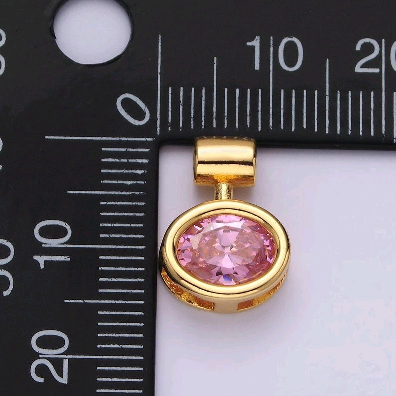 14k gold filled pink, clear oval bezel pendant