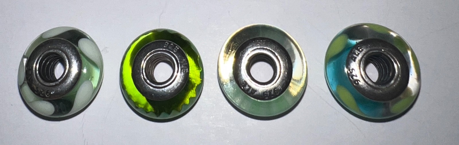 Set of 4 retired Pandora green Murano charms – complete descriptions listed