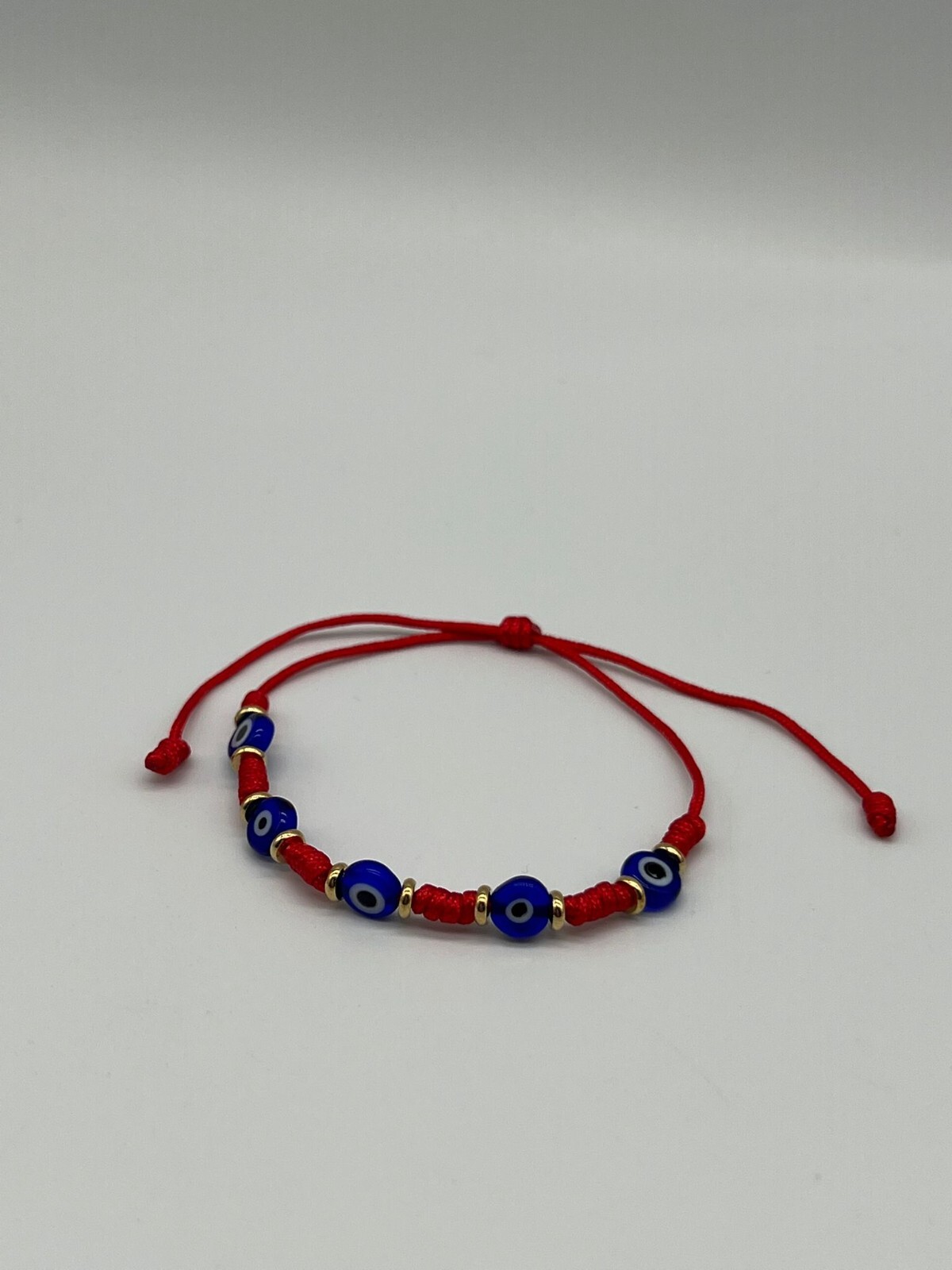 5 Evil Eyes Red String Adjustable Bracelet Gold Plated Pack of 12