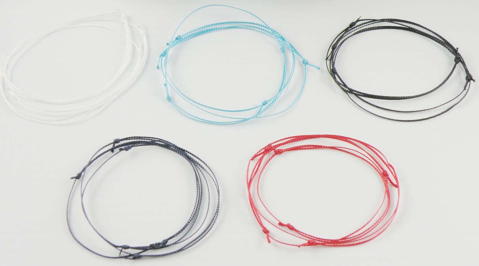 Set of 3 -Nano Cord .75 mm Bracelets Single String Surfer Knot Closing Unisex