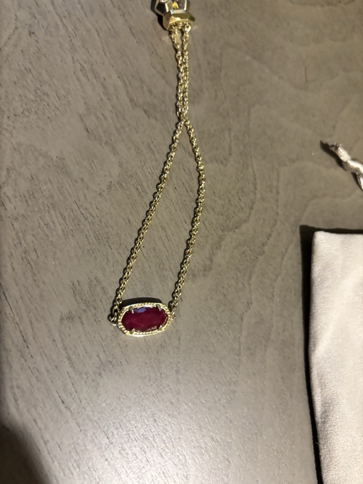 Kendra Scott Gold Tone Cable Chain Bracelet Red Oval Bezel Stone Slide Closure