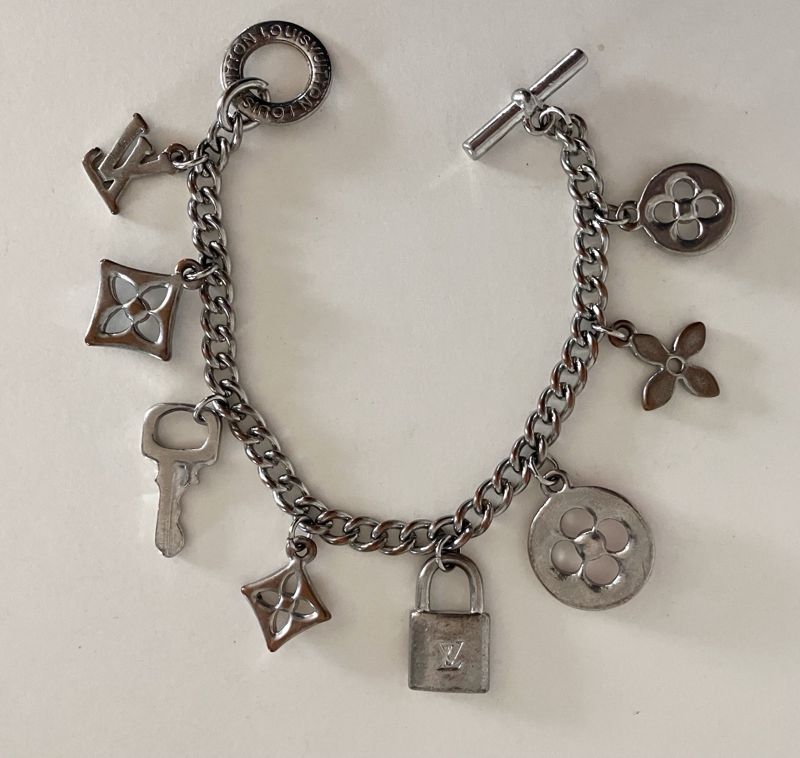 LOUIS VUITTON Vtg RARE Lock & Key, Sweet Monogram Enamel Charm Bracelet 8 Charms
