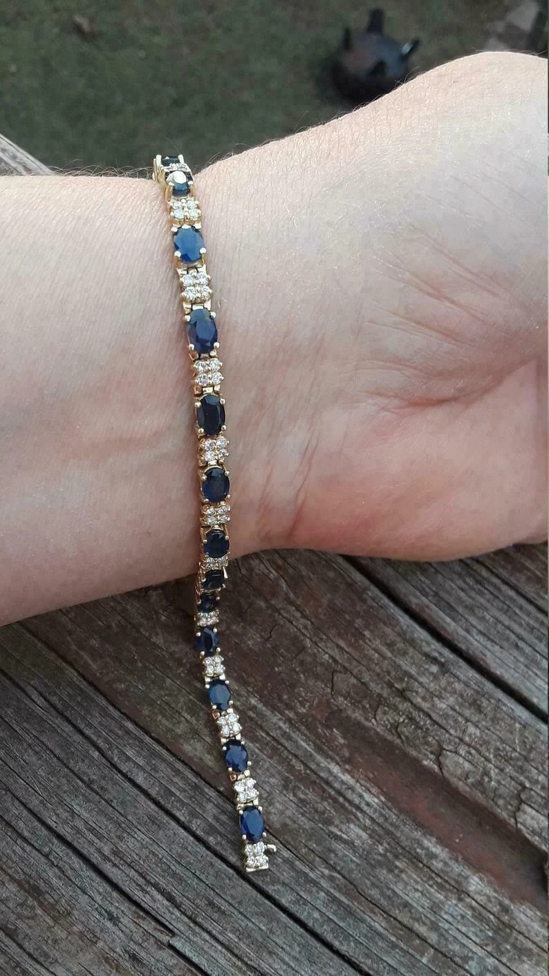 8Ct Oval Simulated Sapphire Women’s Tennis Bracelet In 14K Yellow Gold Plated