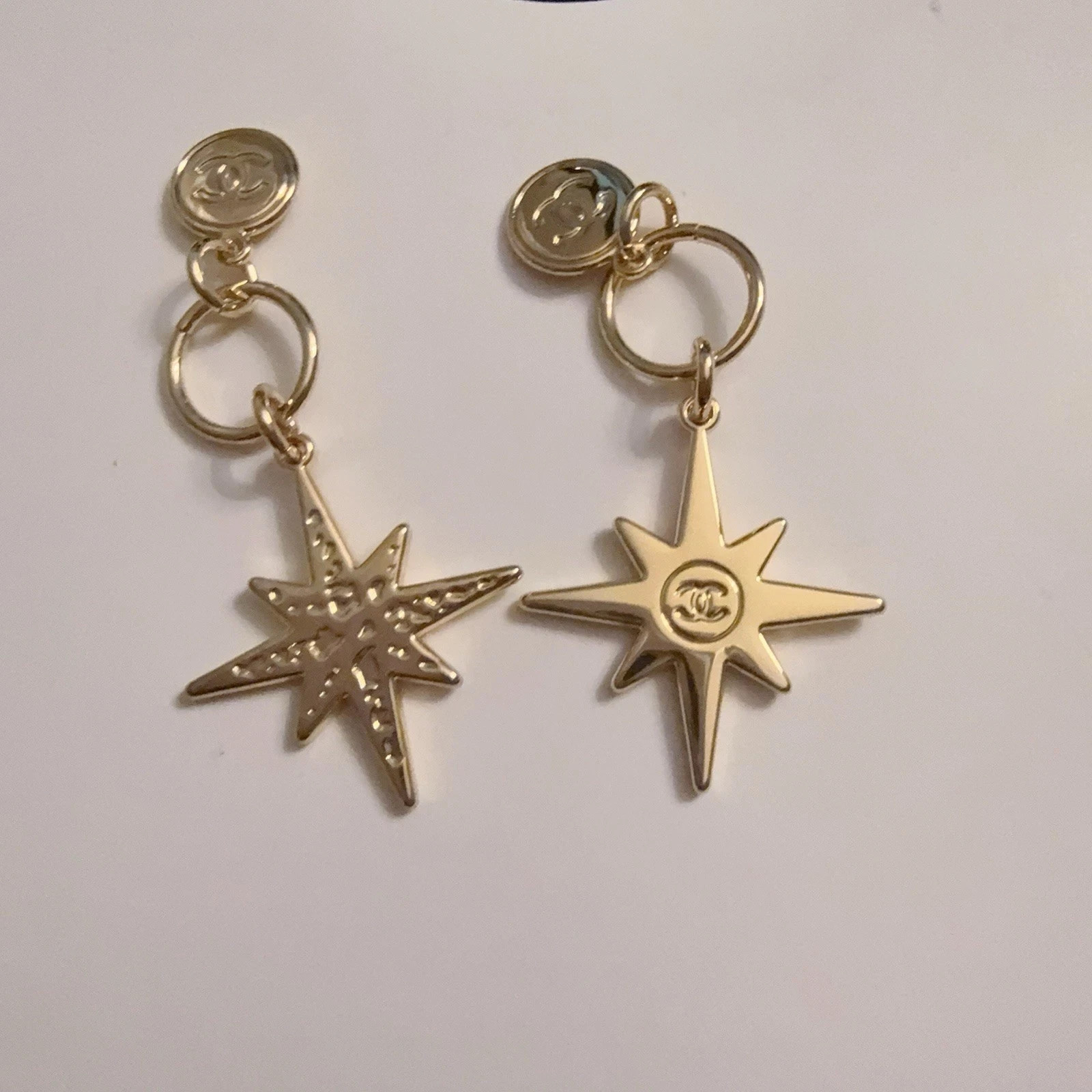 CHANEL Holiday 2022 Christmas Limited Edition Novelty Charm Set of 2 “Comet”
