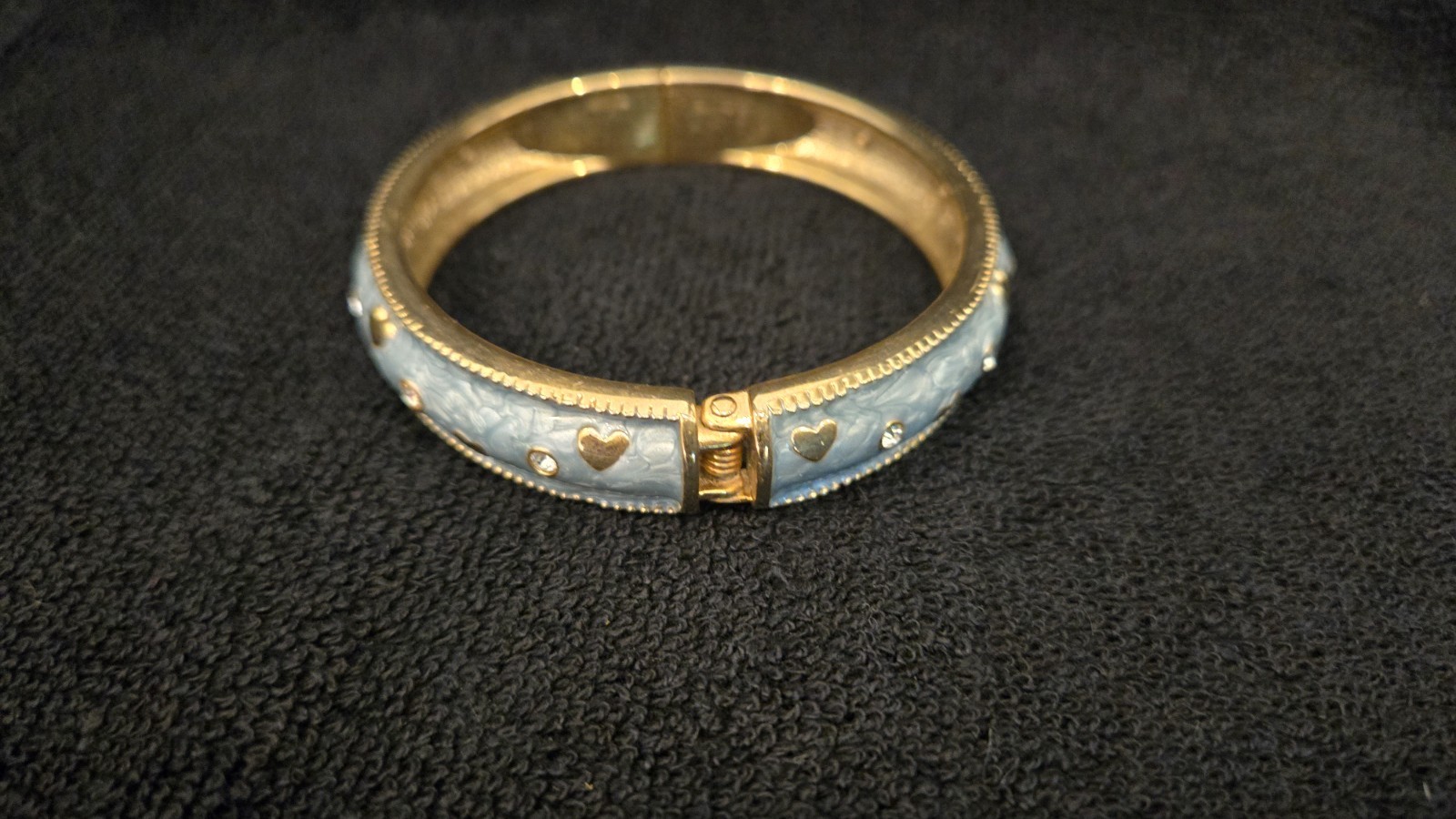 Baby blue gold tone retractable, good condition
