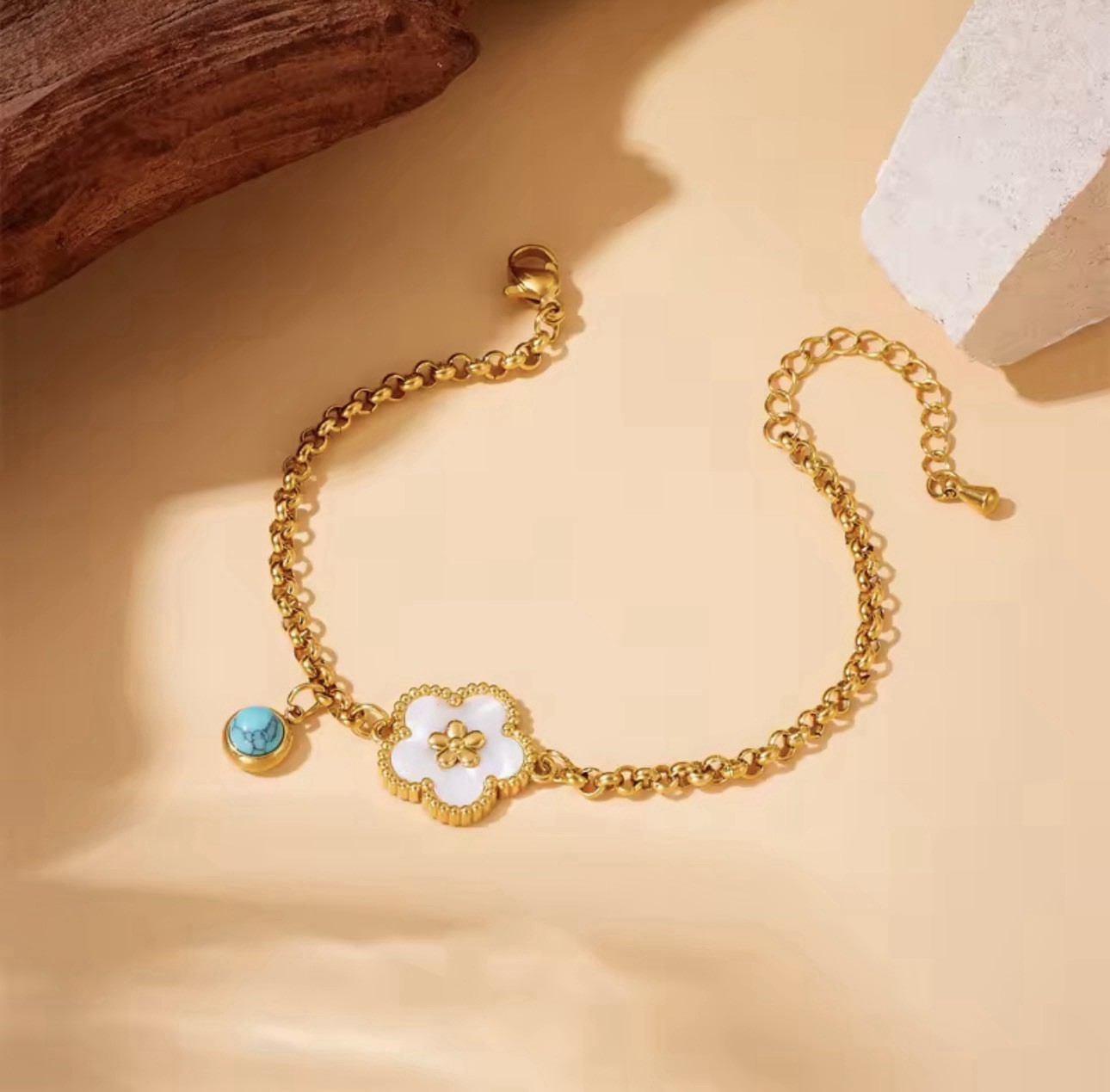 Gold Flower Charm Bracelet with Blue Round Stone, Cable Chain,stainless steel