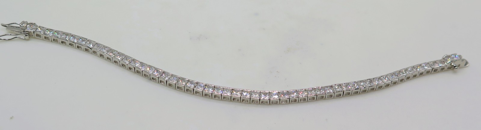 Signed Park Lane 7.5″ Silver Tone Tennis Channel Set Clear Stone Bracelet