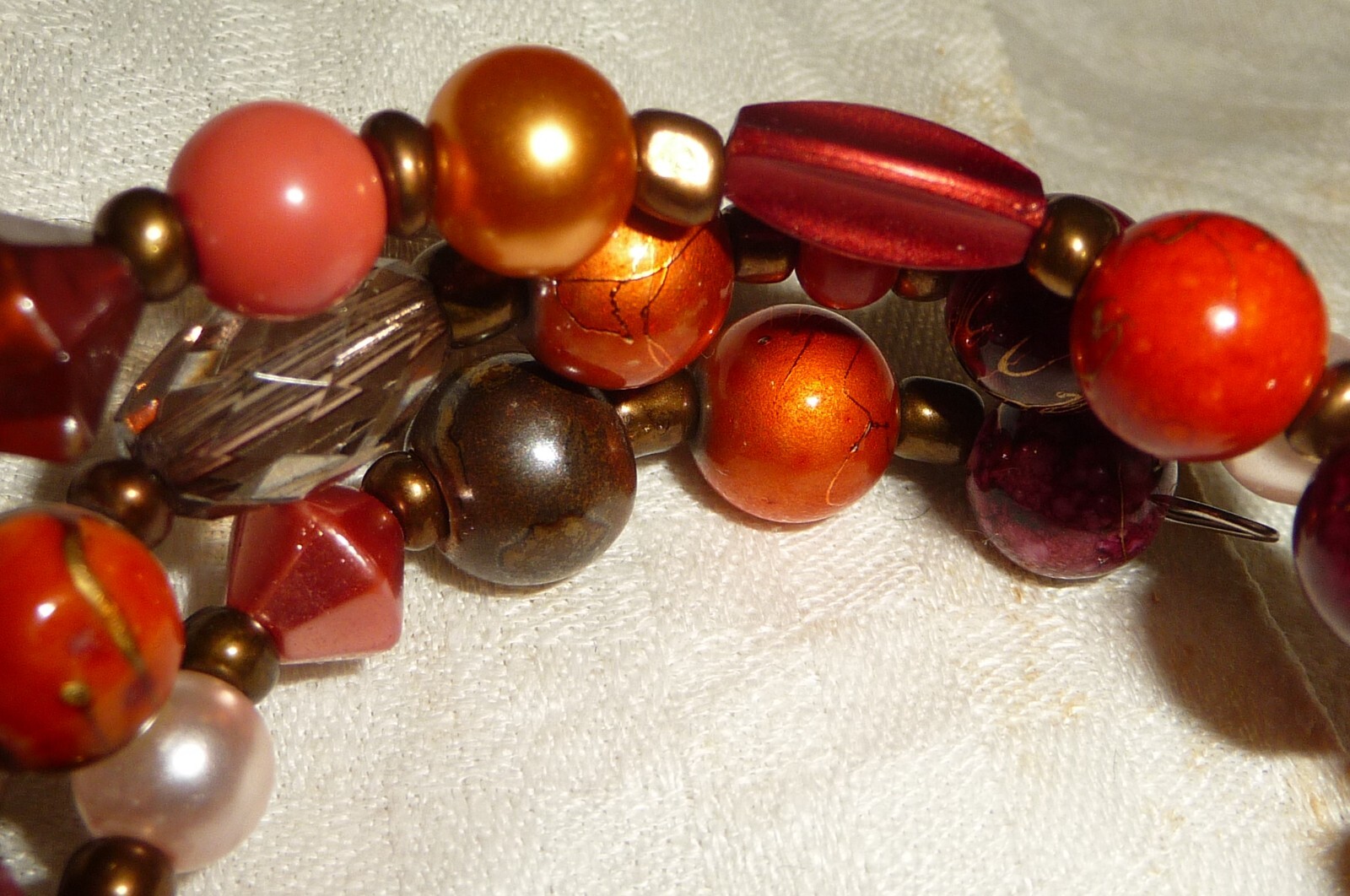 #17/4 SPIRAL BRACELET BROWN & ORANGE BEADS