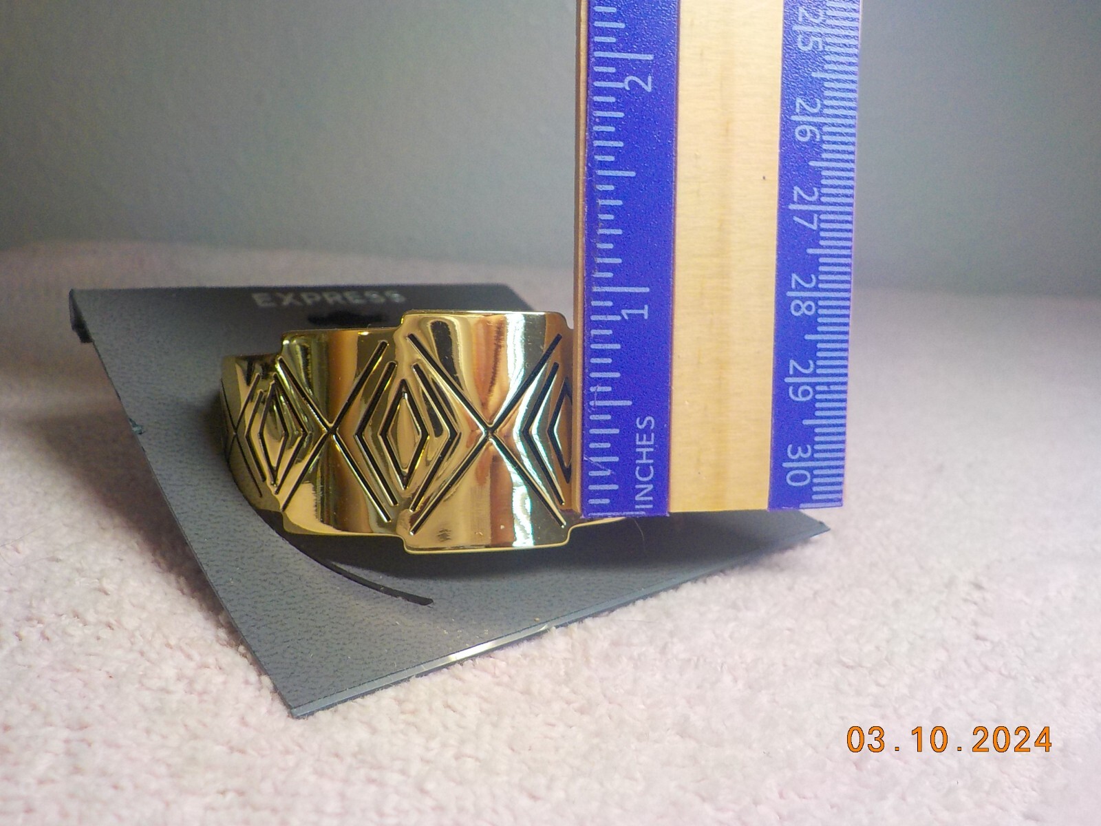 EXPRESS BRAND GOLDTONE METAL OPEN CUFF WITH CHEVRON/DIAMOND DESIGN NEW ON CARD