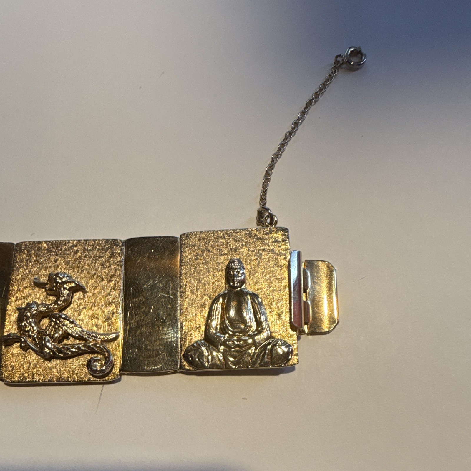 VINTAGE GOLD TONE BUDDHA DRAGON PANEL LINK BRACELET WITH SAFETY CHAIN