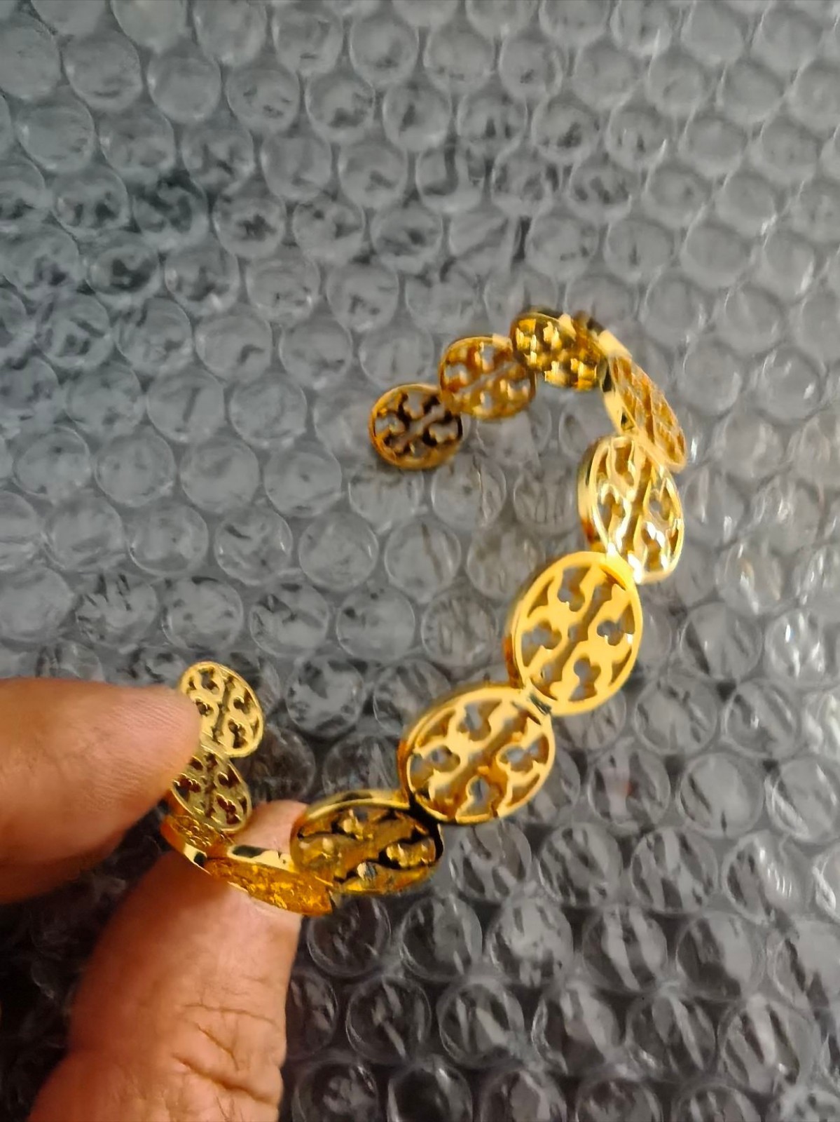 Tory Burch Hollowed-Out TB Logo Bracelet in Gold-Tone