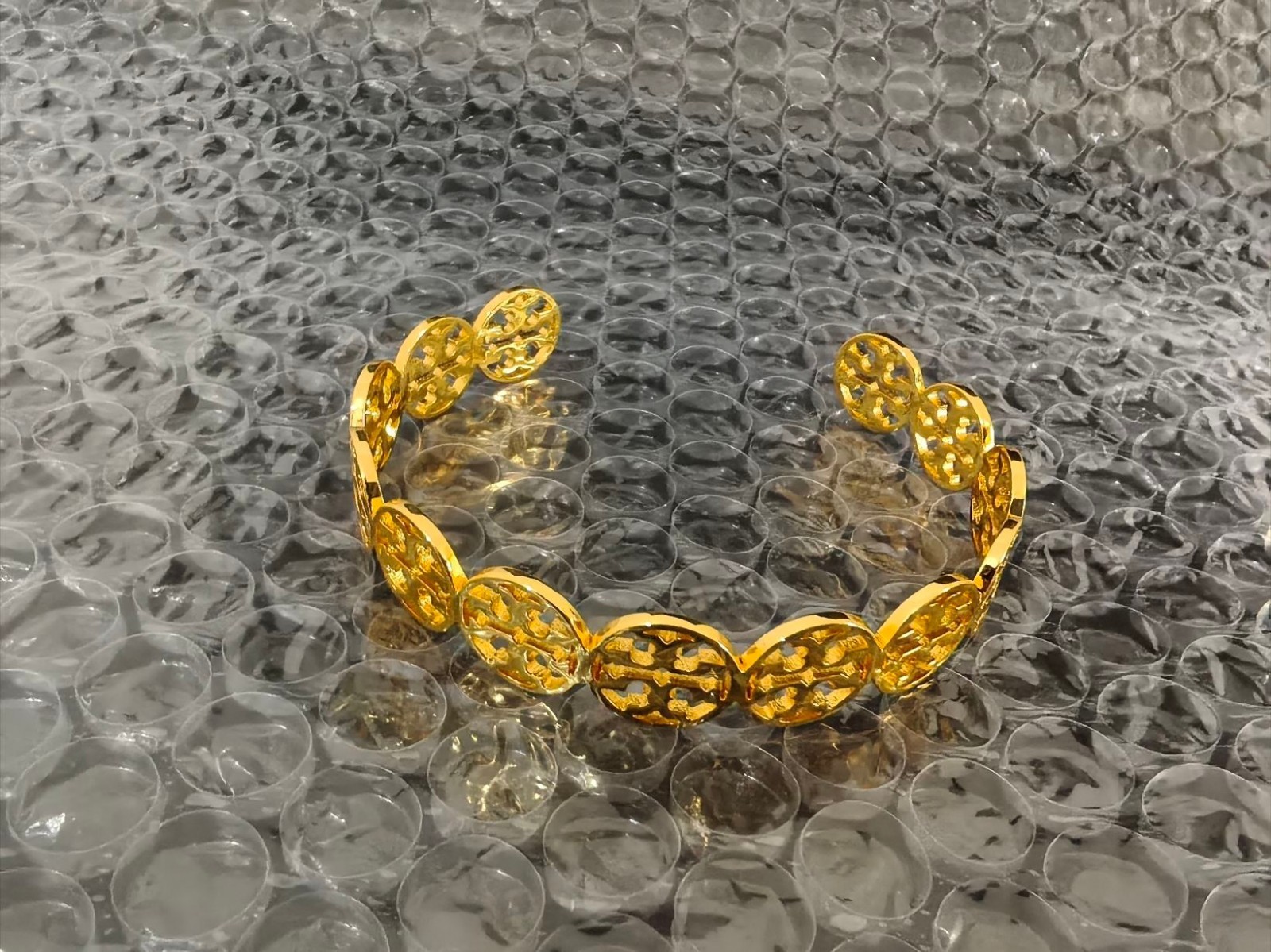 Tory Burch Hollowed-Out TB Logo Bracelet in Gold-Tone