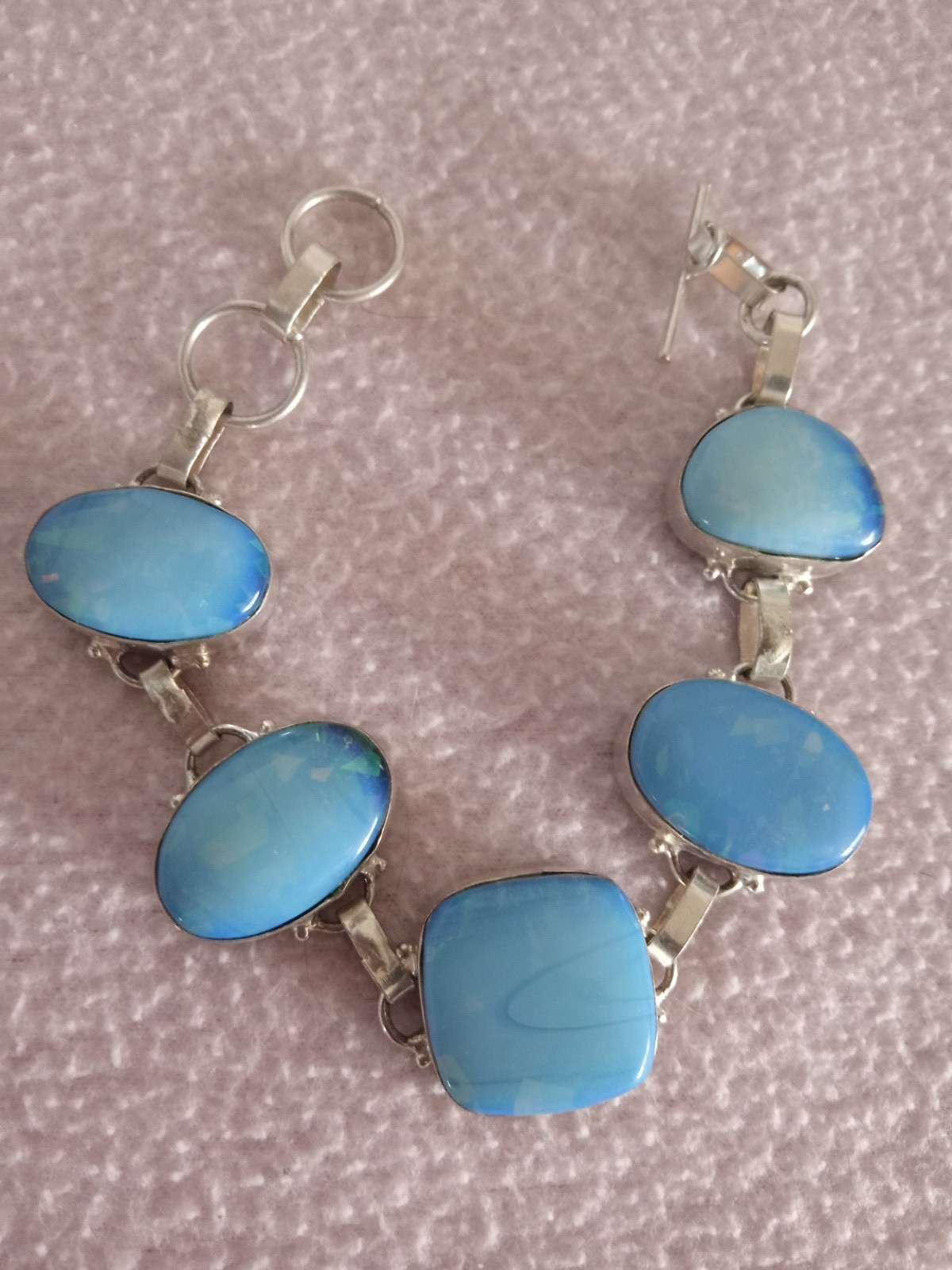 5 BlueStone 8 inch bracelet set in 925 silver with reflective flecks in stones