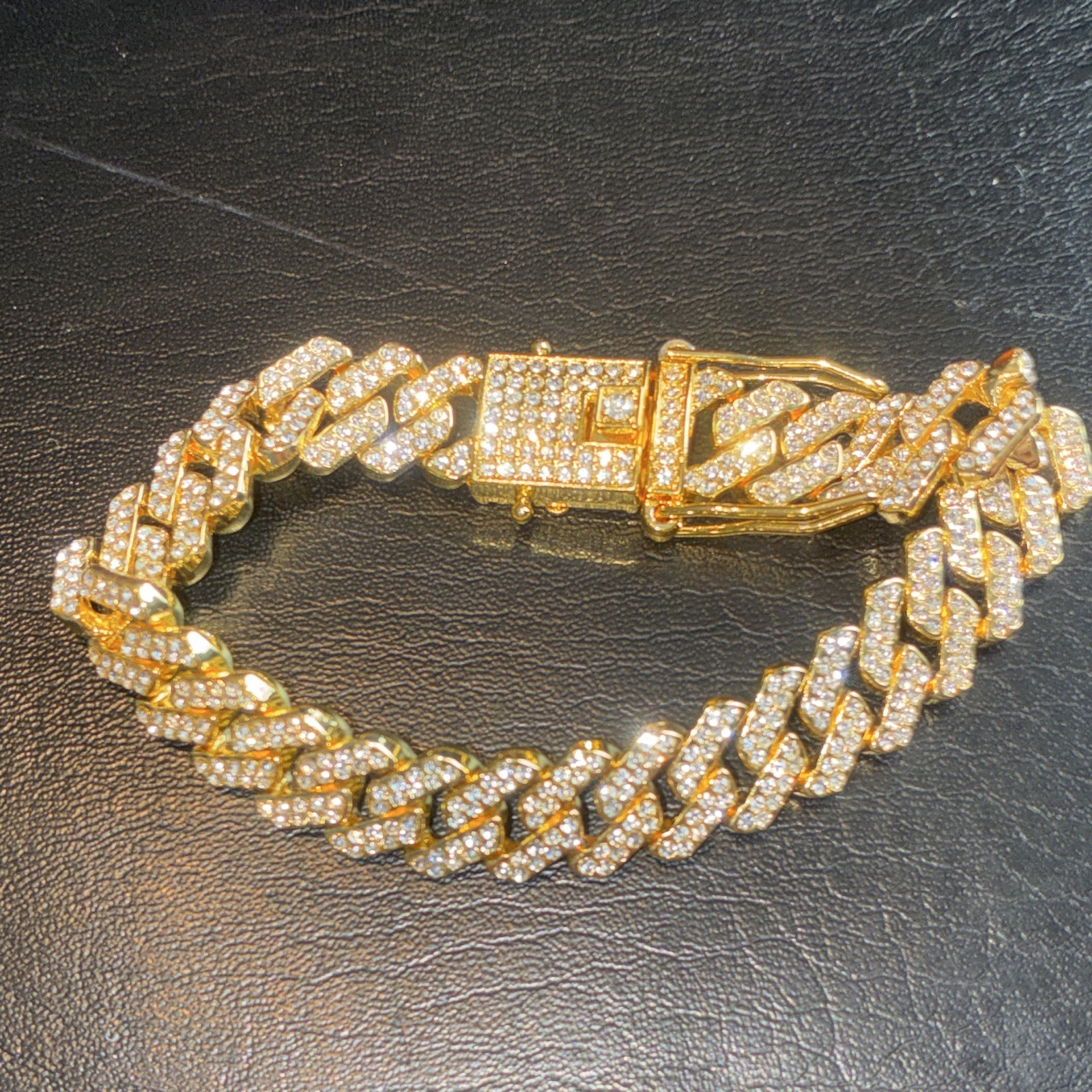 Iced out 14k gold plated CZ bracelet. 8inches and 8mm thick.