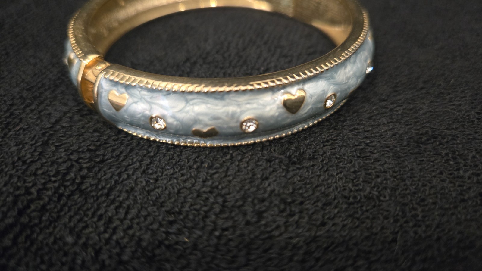 Baby blue gold tone retractable, good condition