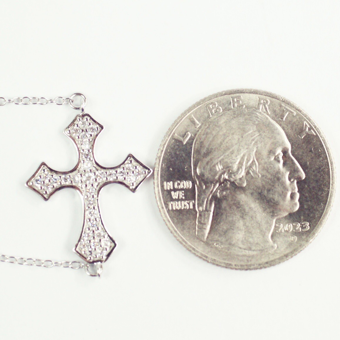 Sterling silver white/colorless CZ pavé cable chain cross bracelet