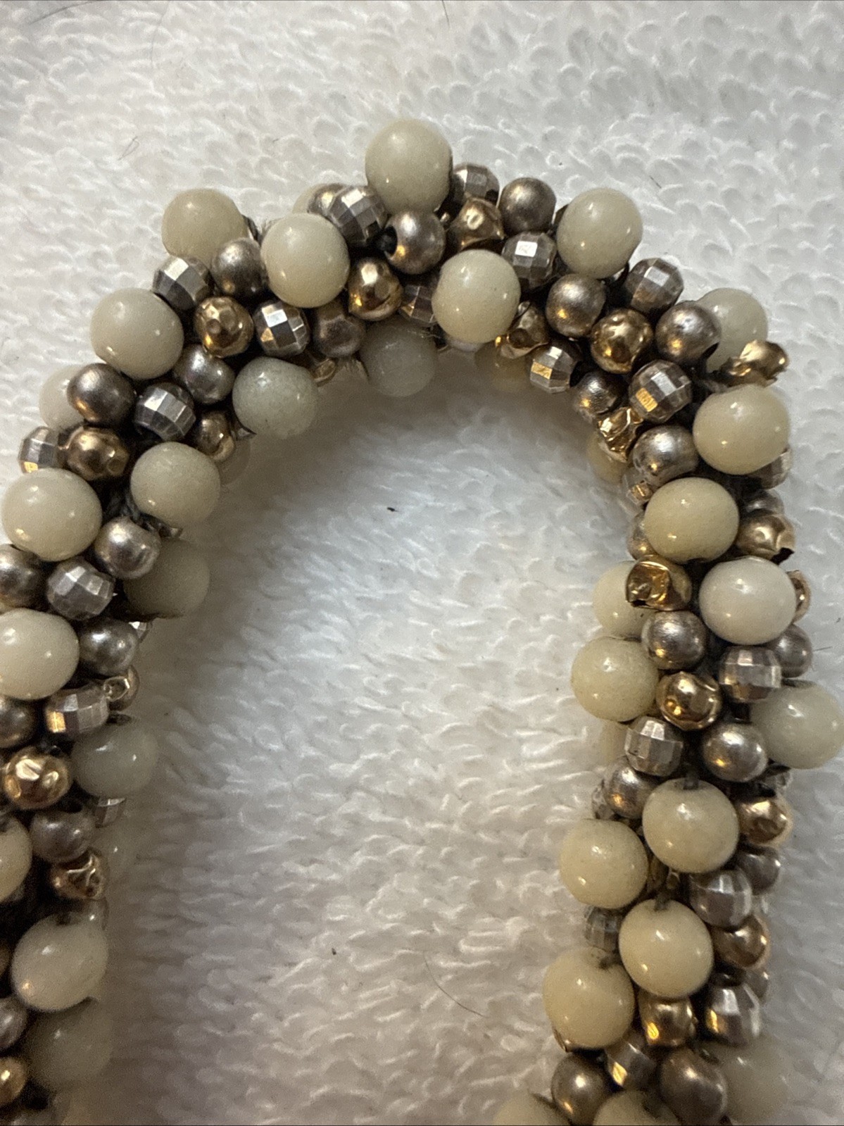 Ivory colored Ceramic Ball Bracelet With Tiny Gold and pewter beads