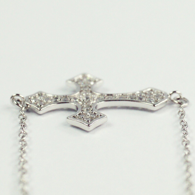 Sterling silver white/colorless CZ pavé cable chain cross bracelet