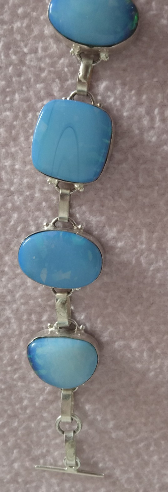 5 BlueStone 8 inch bracelet set in 925 silver with reflective flecks in stones