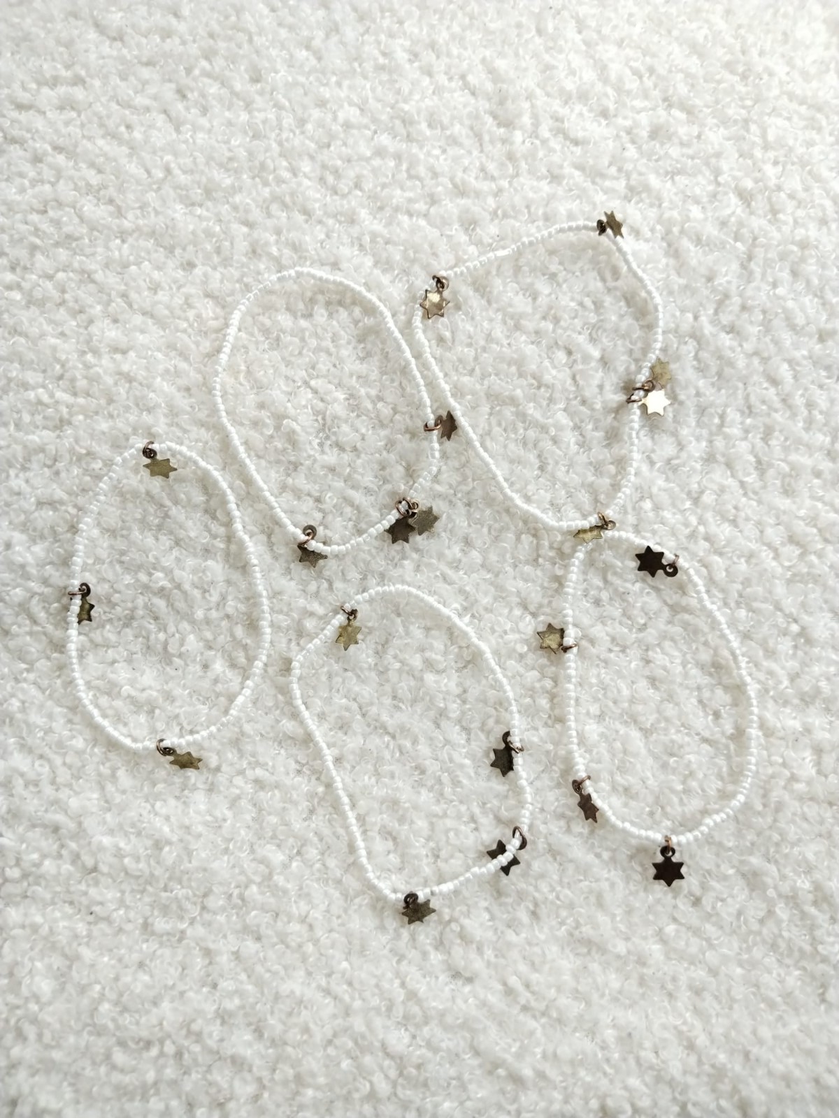 5 X White Glass Seed Bead Elasticated Bracelets , Multi Metal Star Charms
