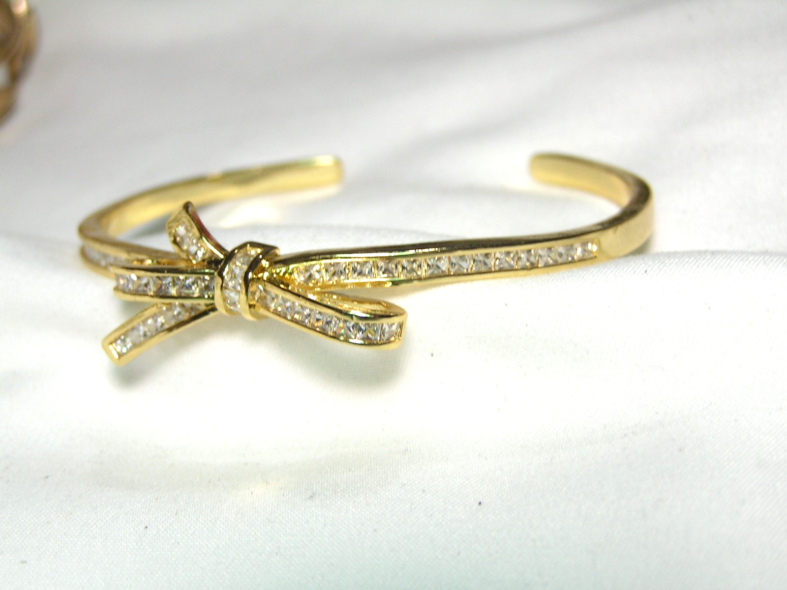 …Beautiful Gold Tone, Channel Set Square Crystals Bow Cuff Bracelet…