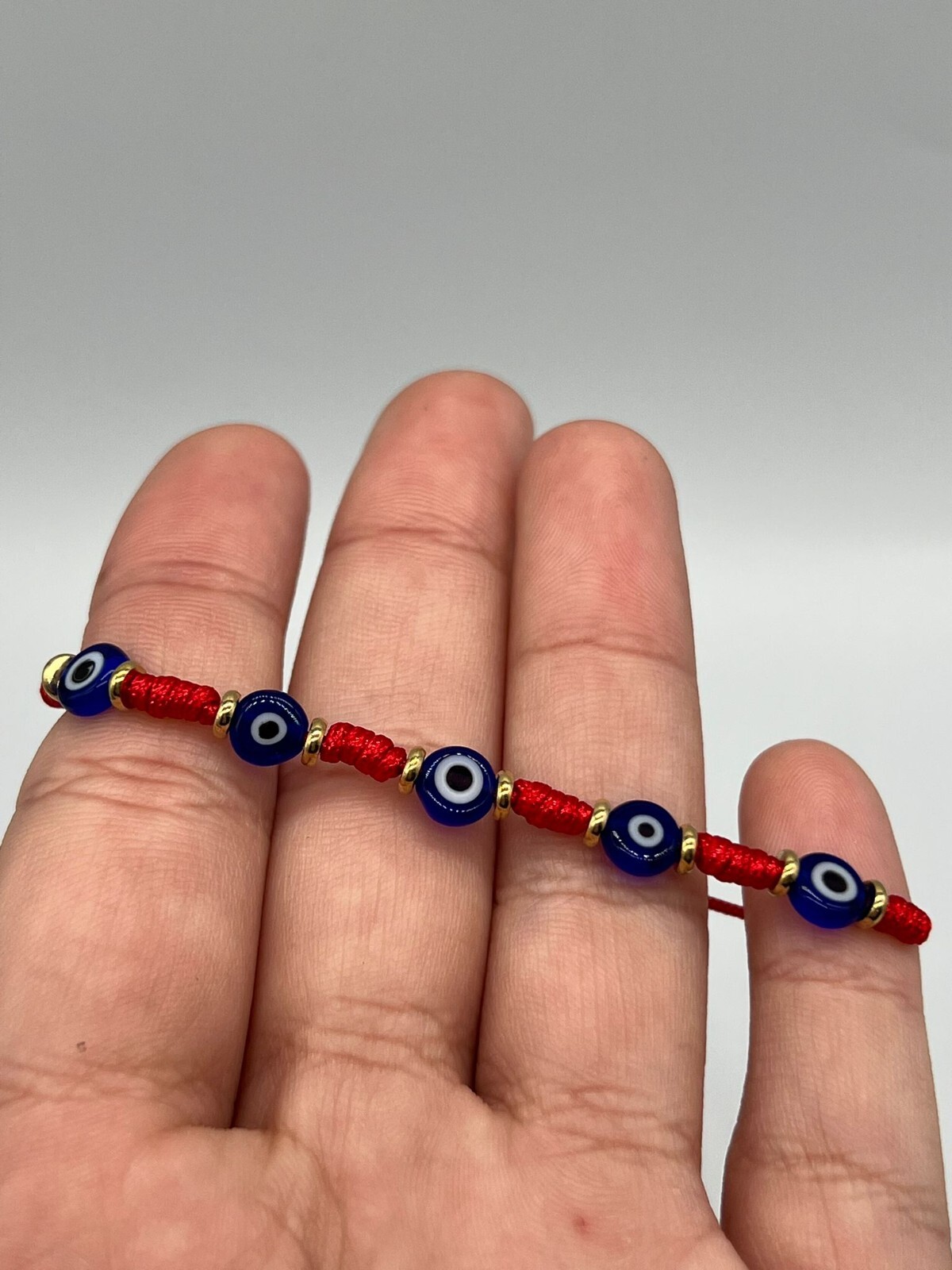 5 Evil Eyes Red String Adjustable Bracelet Gold Plated Pack of 12