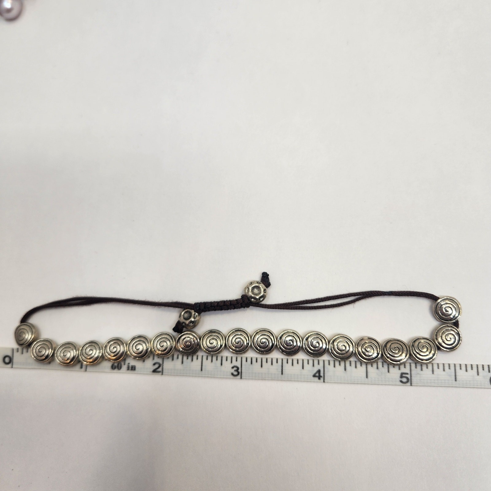 Swirl Round Silver Tone Metal Bead Slider Bracelet Brown Cord Adjustable Unisex