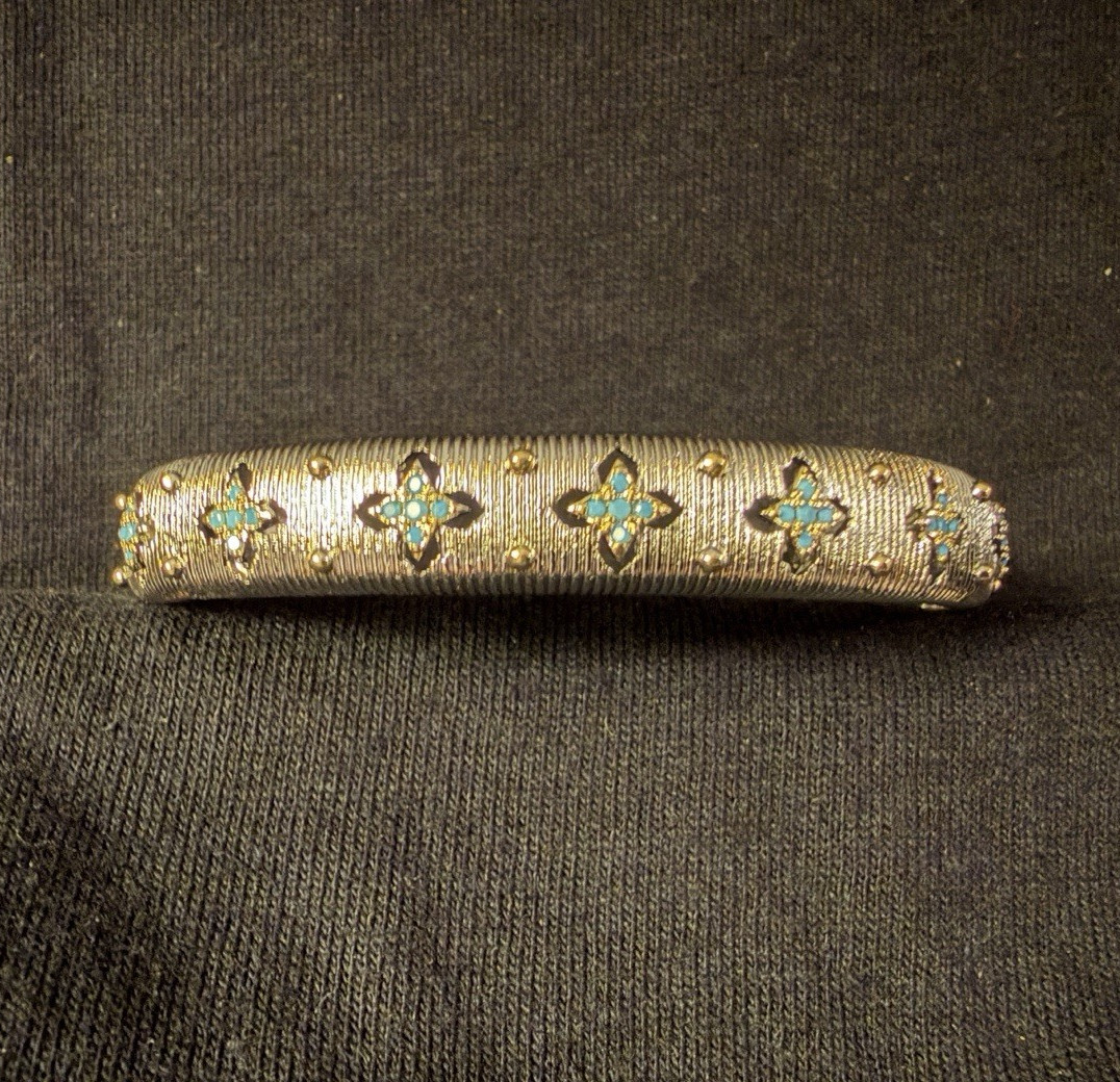 Rhodium plated Cuff Bangle Bracelet w/ Round Blue stones set in clovers