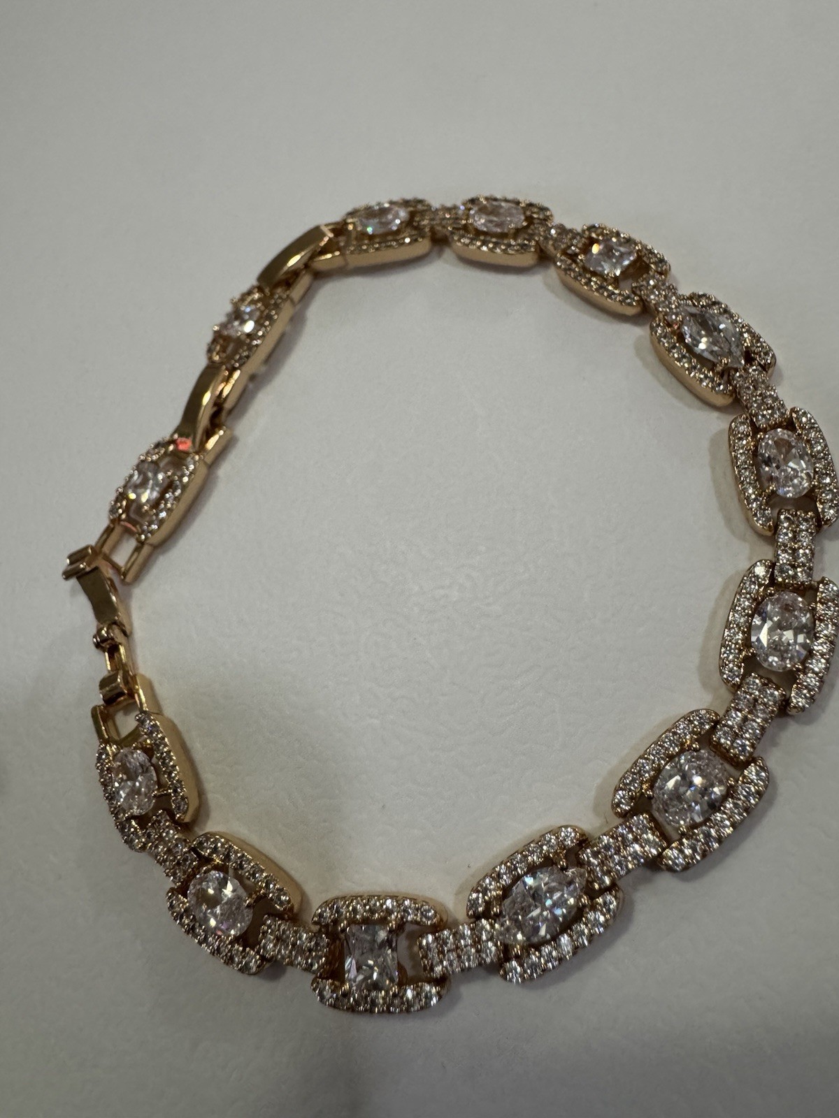 Gold Tone Oval Link Tennis Bracelet Pavé Clear Crystal Round Stones Box Clasp