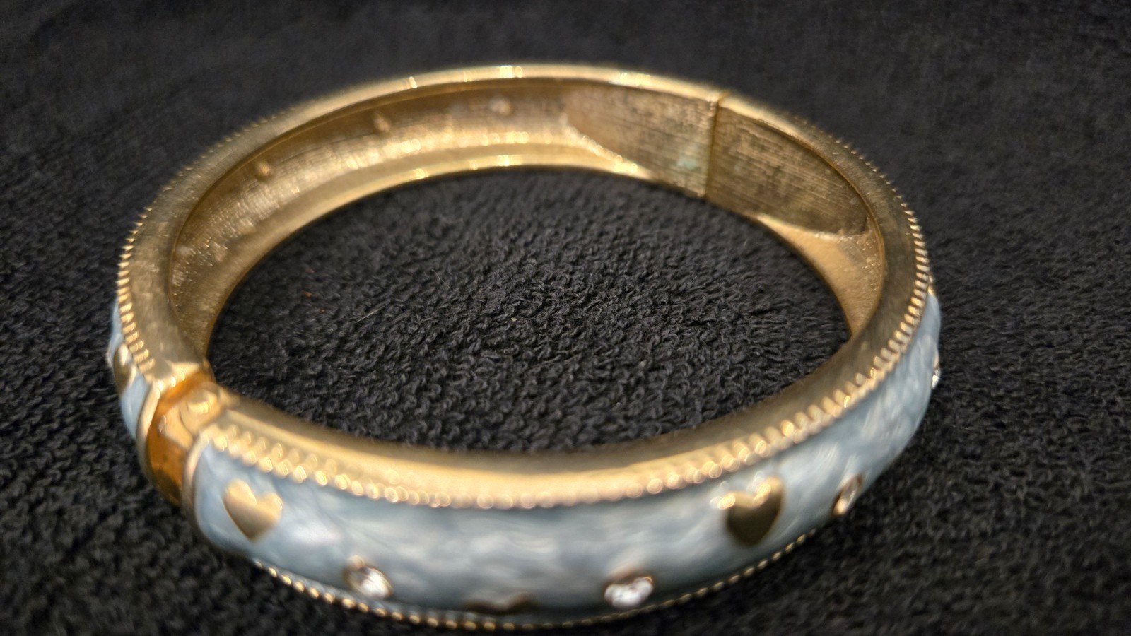 Baby blue gold tone retractable, good condition