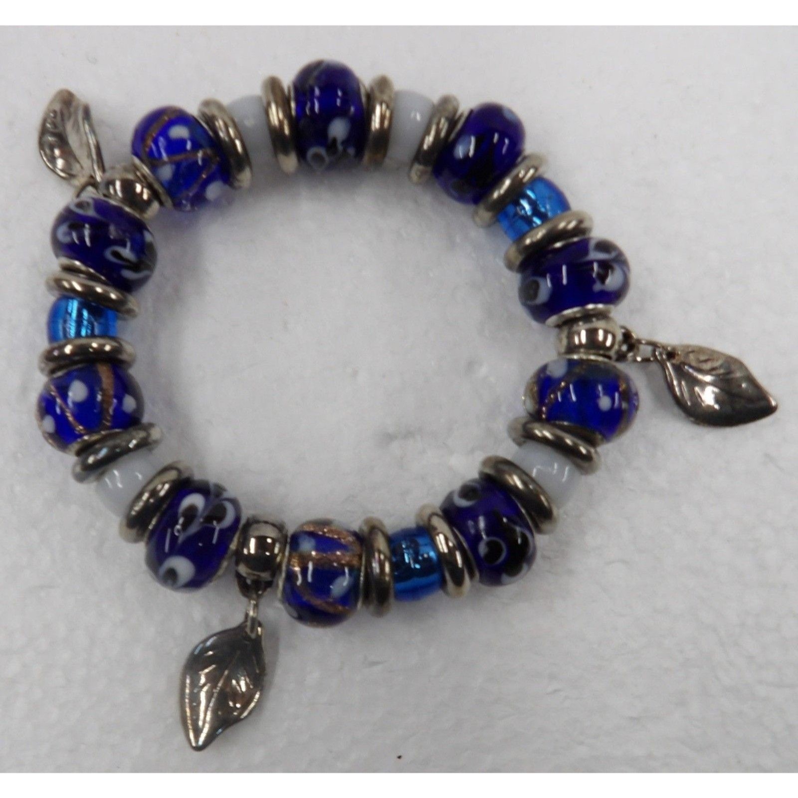 Stretch Bracelet with Blue/White Glass & Silver Tone Metal Beads & Charms