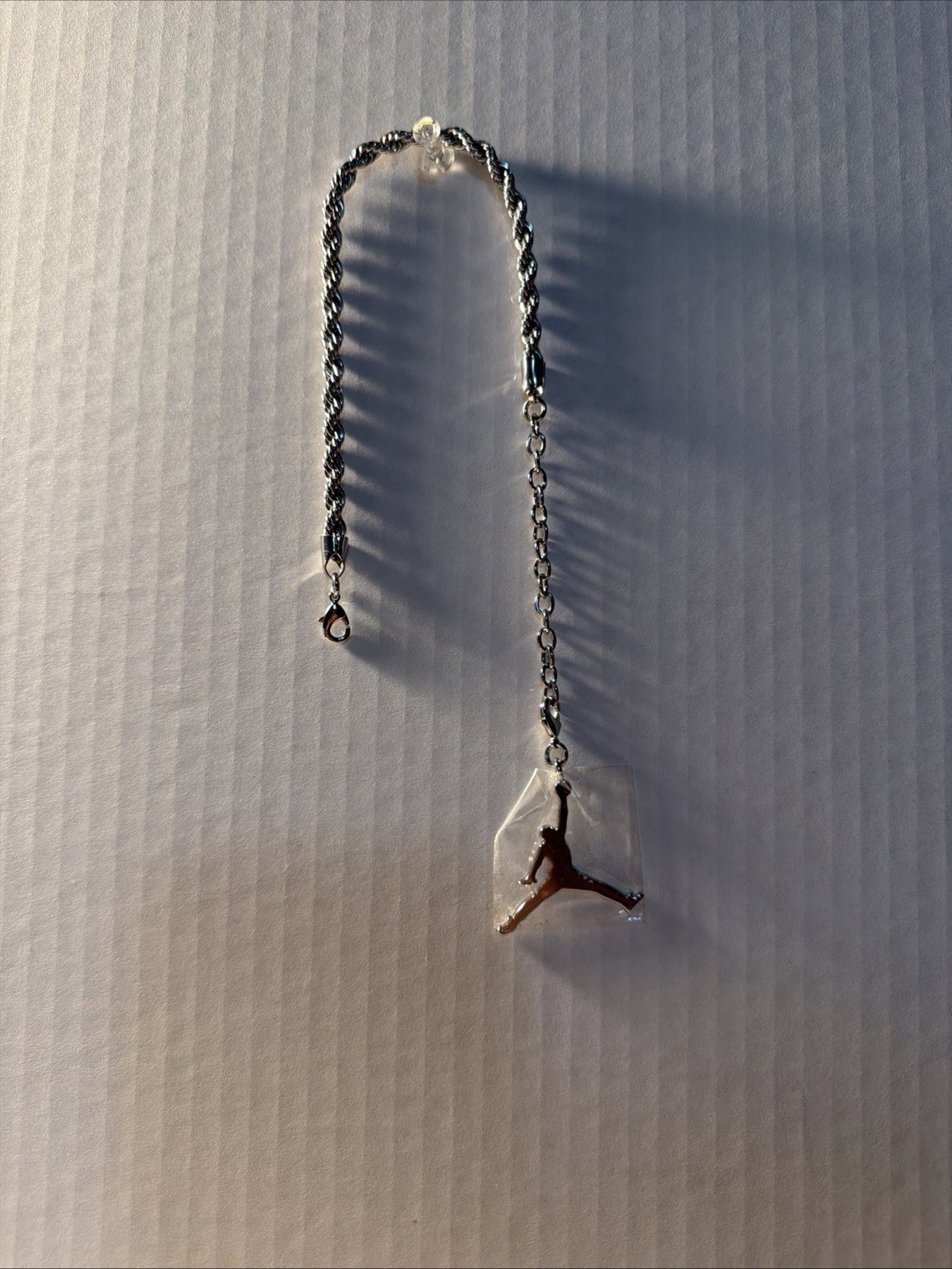 Silver Chain Bracelet with Basketball-Inspired Charm–Studio Wardrobe Prop (2025)