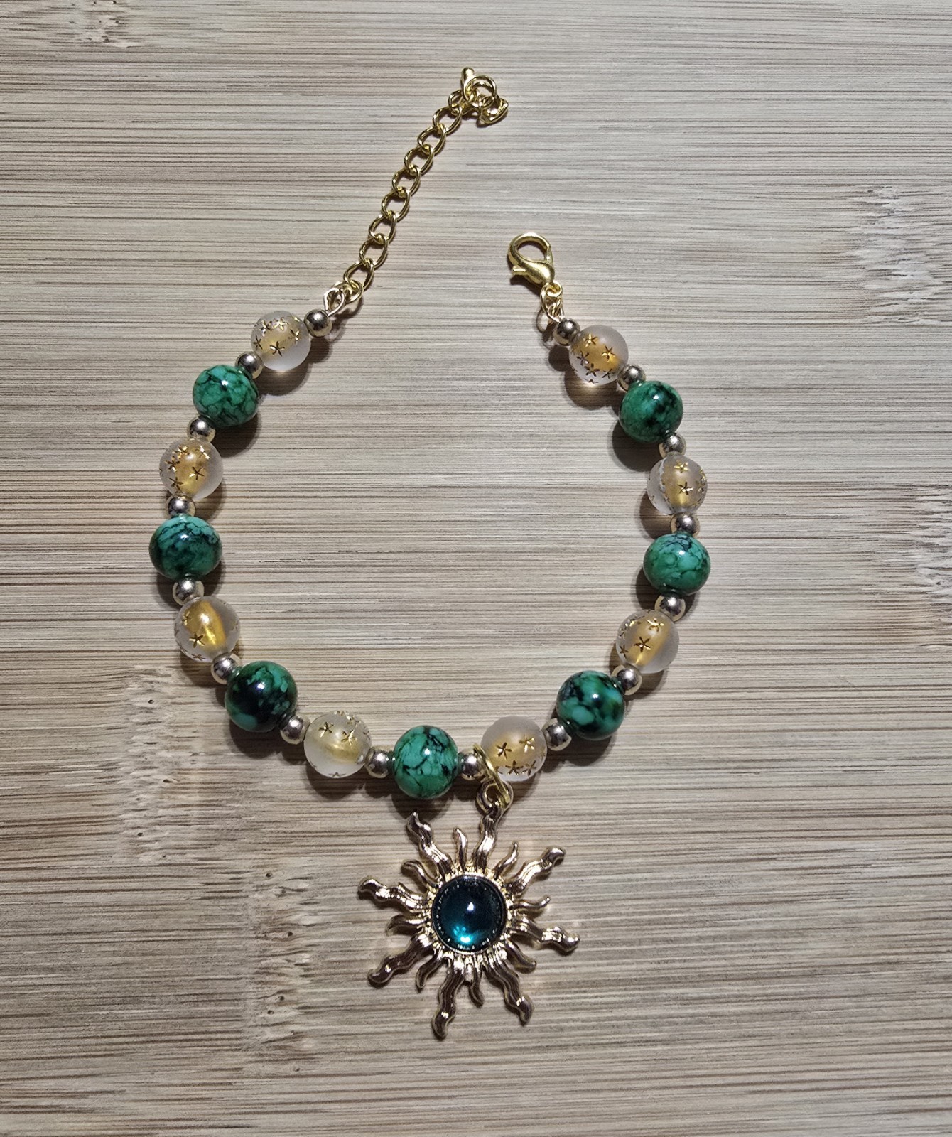 Green, Gold, Frost with Star Print Bracelet with Sun Charms