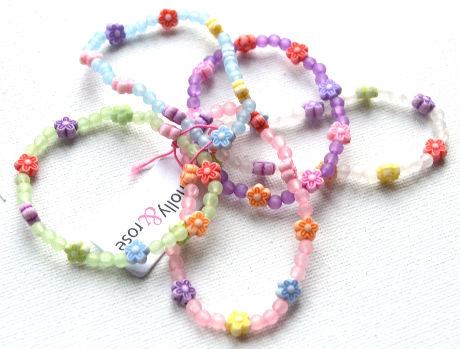 NEW Childrens Pack of 5 flower pastel coloured charm bracelet fashion jewellery