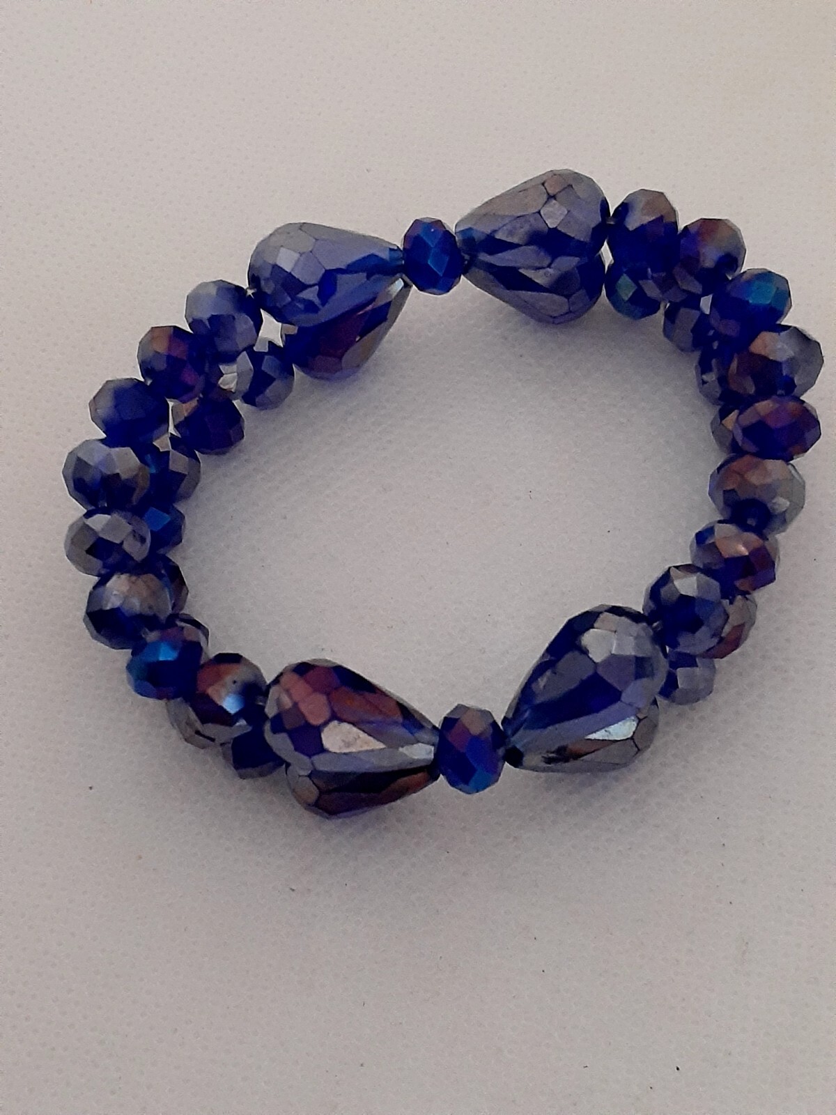 Multi Faceted glass Blue Bow Design Bead Stretch Bracelet