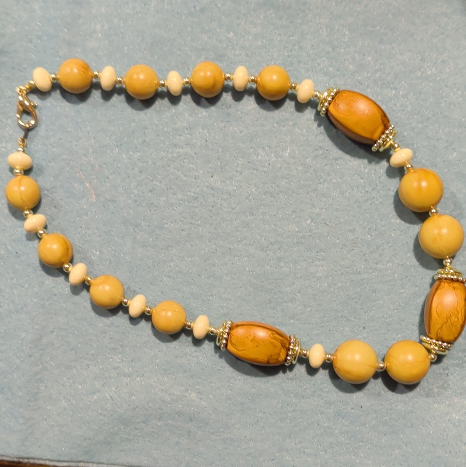 Yellow Wood Round Beaded Bracelet with Lobster Clasp Beads Round Shape