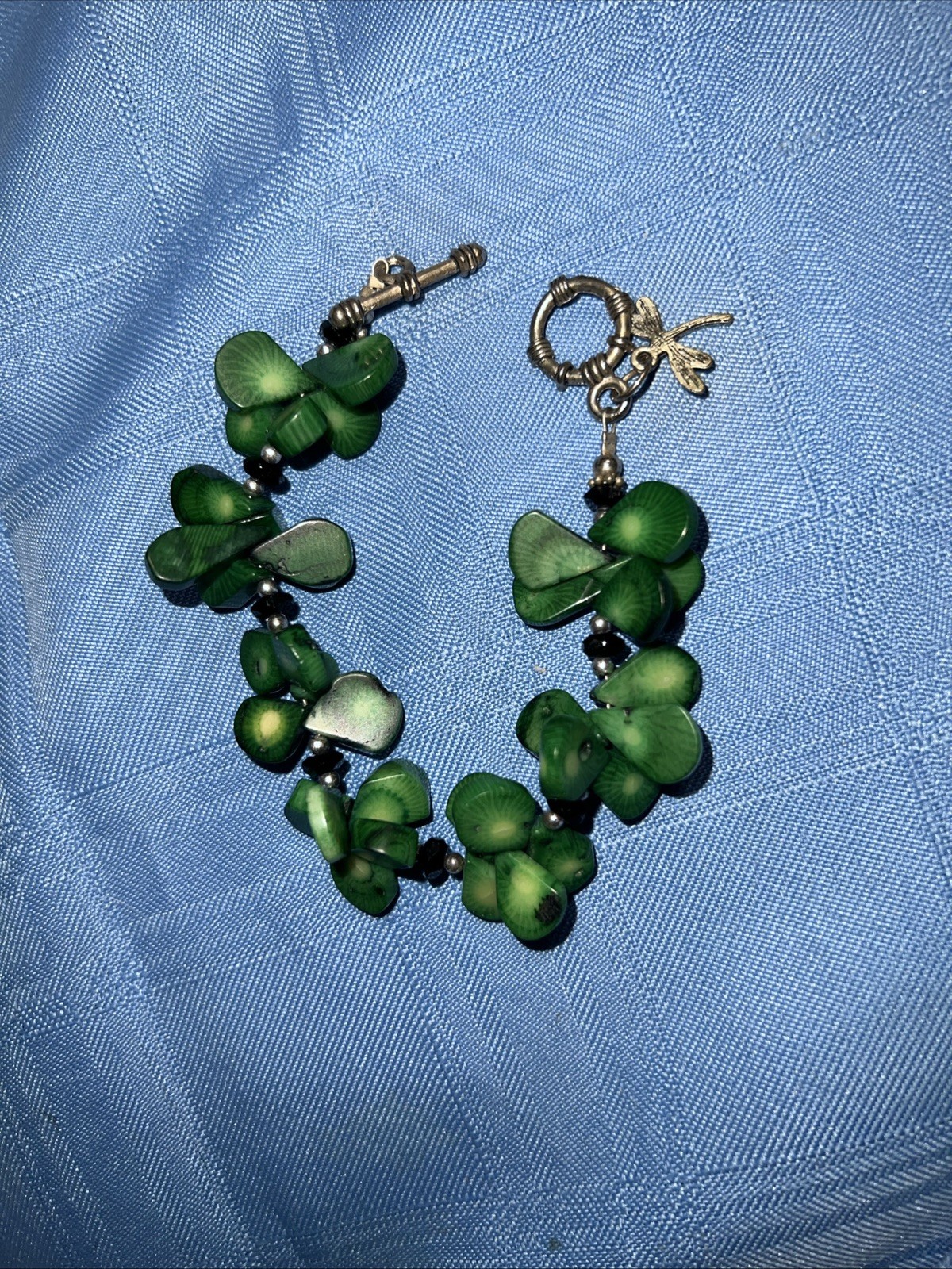 Green Clover Statement Bracelet – Carved Beads, Dragonfly Charm, Toggle Clasp