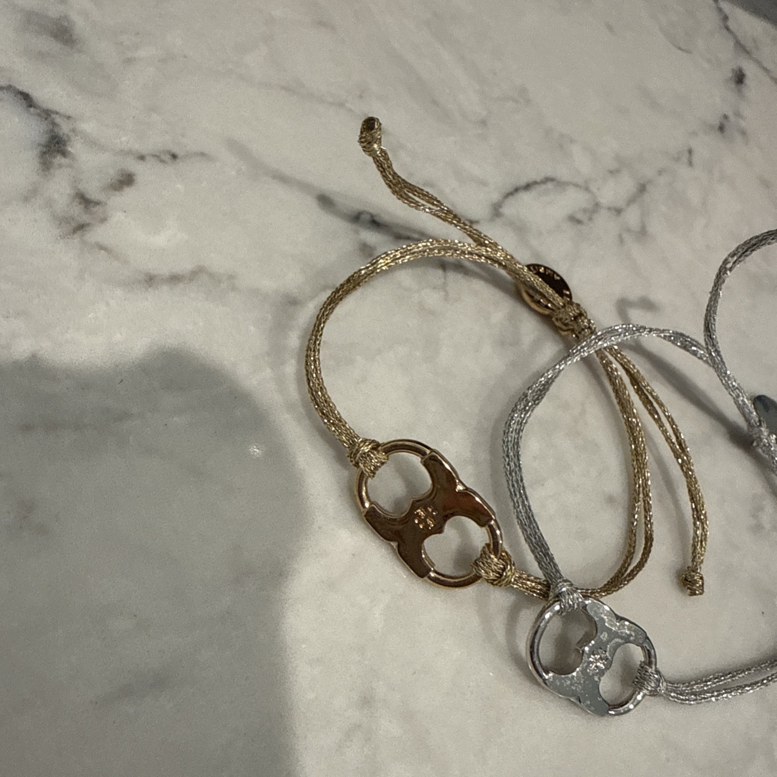 Tory Burch Corded Adjustable Bracelets. Set Of 2. (1) Gold And (1) Silver.